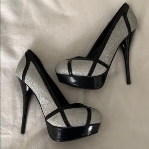 Brand new! Women’s size 8 black and silver heels